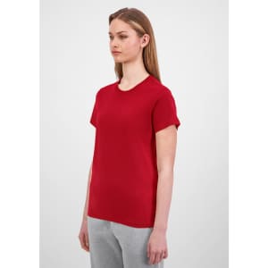 A red short sleeve women's t-shirt displayed on a mannequin, featuring a simple design and a logo.