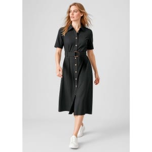 A black midi dress with a button-down front, short sleeves, and a belt, paired with white sneakers.