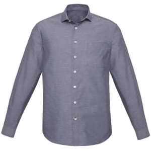 A classic fit long sleeve shirt in blue with a single chest pocket and button-up front. Features a logo.