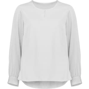 A women's long sleeve blouse in a soft white colour with a round neckline and button detail. It features a relaxed fit.
