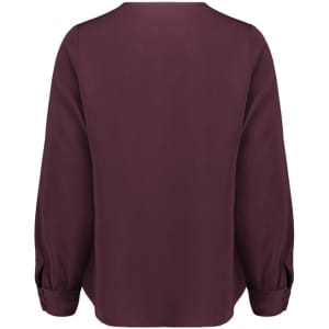 A long-sleeve blouse in a deep burgundy colour, featuring a simple back design with gathered sleeves.