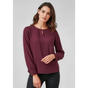 A burgundy long sleeve blouse with a round neckline and keyhole detail, featuring gathered sleeves.