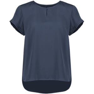 A women's short sleeve blouse in navy blue with a round neckline and a slightly longer back hem. It features rolled sleeves.