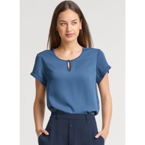 A blue short sleeve blouse with a keyhole detail at the neckline, featuring rolled cuffs.