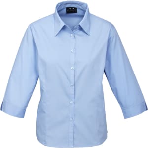 A light blue women's 3/4 sleeve button-up shirt with a collar and a logo on the chest.