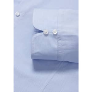 A light blue women's luxe long sleeve button-up shirt featuring a double cuff design and buttons.
