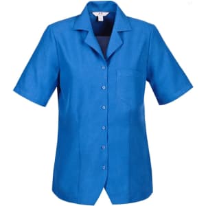 A short-sleeved blue overblouse with a collar and a single chest pocket, featuring buttons down the front and a logo.