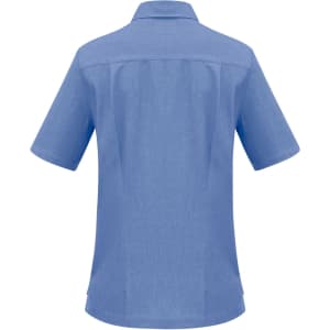 A blue women's overblouse with short sleeves and a collar, featuring a branded logo on the back.