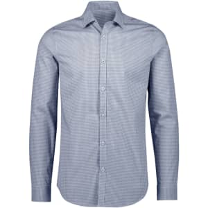 A tailored long sleeve shirt in a blue and white check pattern with a button-up front and a collar.