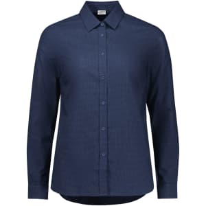 A women's long sleeve button-up shirt in navy blue with a collared neckline and a logo.