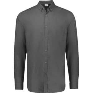 A long sleeve button-up shirt in grey with a single chest pocket and a logo on the collar.