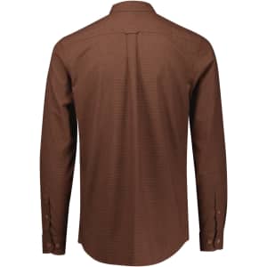 A brown long sleeve button-up shirt featuring a back yoke and button cuffs. The shirt has a branding logo.
