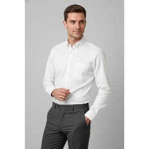 A white long sleeve button-up shirt with a pocket, paired with grey trousers. The shirt features a logo.