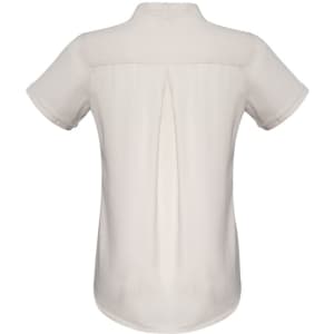 A short sleeve button-up shirt in a cream colour with a back pleat and a logo.