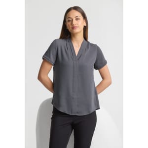 A grey short sleeve button-up shirt with a relaxed fit and a v-neck design, featuring rolled sleeves.