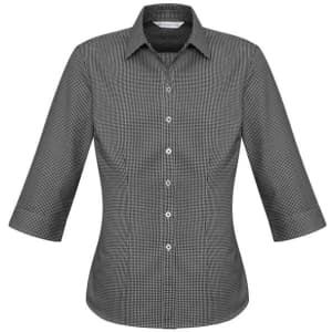 A women's button-up shirt in a black and white check pattern with 3/4 sleeves and a fitted design.