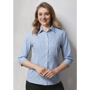 A button-up women's shirt featuring a light blue and white gingham pattern, with 3/4 sleeves and a collar.