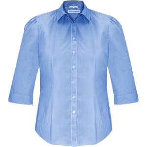 A women's button-up shirt in light blue with 3/4 sleeves and a fitted design, featuring a logo on the label.