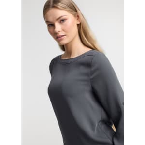 A grey women's boatneck top with long sleeves displayed on a model against a neutral background.