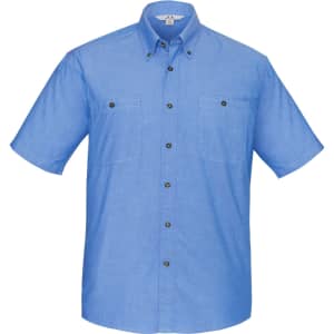 A light blue chambray short sleeve shirt with button closures and two chest pockets, featuring a logo.