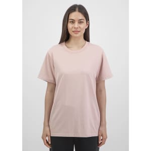 A women's short sleeve tee in soft pink, featuring a classic fit and a logo on the chest.