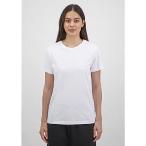 A white short sleeve t-shirt for women, displayed on a model against a neutral background. Features a logo.