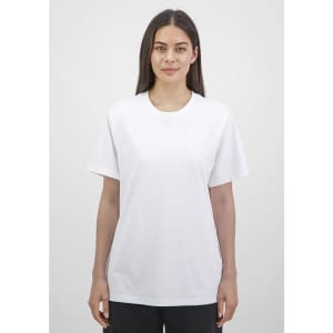 A white women's short sleeve tee is displayed on a model against a neutral background. The shirt has a relaxed fit.