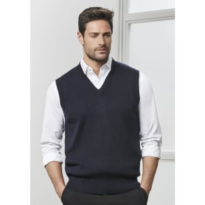 A men's woolmix knit vest in navy, featuring a V-neck and worn over a white shirt, with a logo on the side.