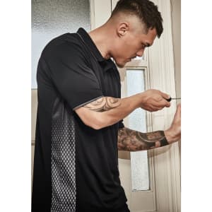 A man wearing a black short sleeve polo shirt with patterned side panels, holding a screwdriver.