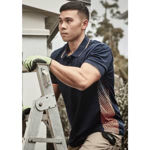 A dark navy short sleeve polo featuring a patterned side detail, worn by a man on a ladder.