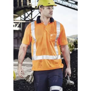 A men's short sleeve polo shirt in vivid orange with reflective stripes, suitable for workwear. Features a pocket and branding.