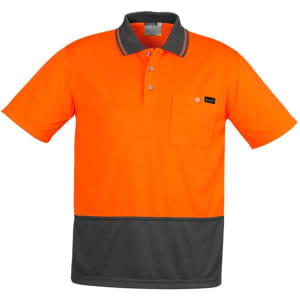 An orange and grey short sleeve polo shirt with a pocket and a logo on the chest.
