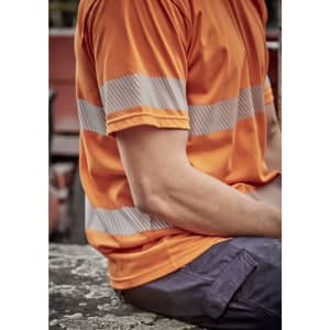 A men's short-sleeve hi-vis orange cotton tee with segmented reflective tape on the sleeves, featuring a relaxed fit.