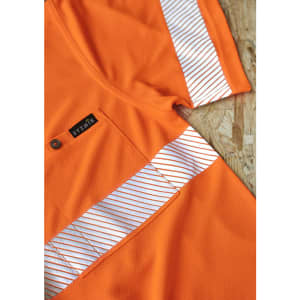 An orange short sleeve polo shirt featuring segmented reflective tape and a logo. The material appears breathable and mesh-like.