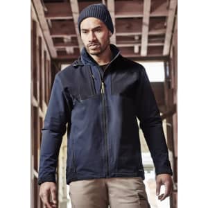 A man wears a navy blue unisex waterproof jacket with a hood. The jacket has a logo and is styled for casual wear.