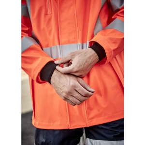 A heavy-duty waterproof jacket in bright orange with reflective stripes, featuring black cuffs. There is a logo on the jacket.