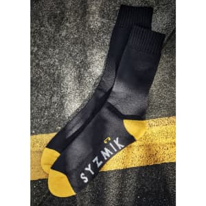 A pair of black work socks featuring yellow contrast at the toe, with branding.