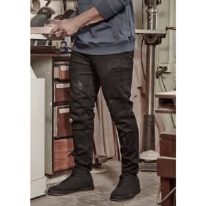 Mens Streetworx Stretch Jean in black, featuring a slim fit design, worn with a blue sweatshirt and black shoes.