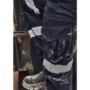 A pair of navy work pants featuring cooling stretch material and striped taping details. They have multiple pockets and a logo.