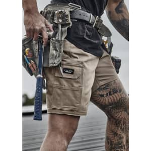 Men's essential stretch cargo shorts in light brown, featuring multiple pockets and a branding label.