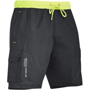 A pair of black board shorts with a drawstring waistband and neon green accents. Features a logo and cargo pockets.