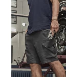 Men's rugged stretch shorts in dark grey, featuring cargo pockets and a sleek design, held by a person with a tool.