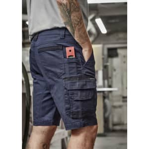 Men's streetwear shorts in navy with multiple pockets, featuring a logo and a rugged design suitable for workwear.