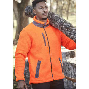 A man wearing an orange unisex full zip Sherpa fleece jacket, carrying a log over his shoulder.