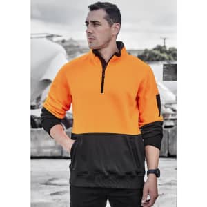 A unisex pullover in bright orange and black, featuring a half zip and a pocket, with a logo on the sleeve.