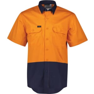 A short sleeve work shirt featuring a bright orange upper and navy blue lower with two front pockets and a logo.