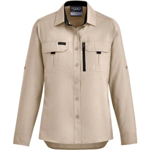 A long-sleeve women's button-up shirt in khaki, featuring two chest pockets and a zip pocket, with branding.