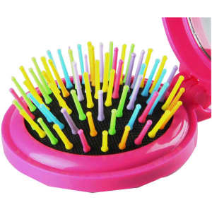 A portable folding hair brush in pink with a mirror, featuring colourful bristles in various pastel shades.