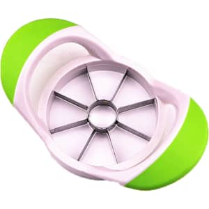 An apple cutter featuring a white and green design, with a metal slicing core and six wedges.