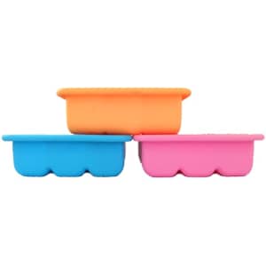 Three silicone ice cube trays in orange, blue, and pink stacked together. Each tray has a unique shape and features a logo.